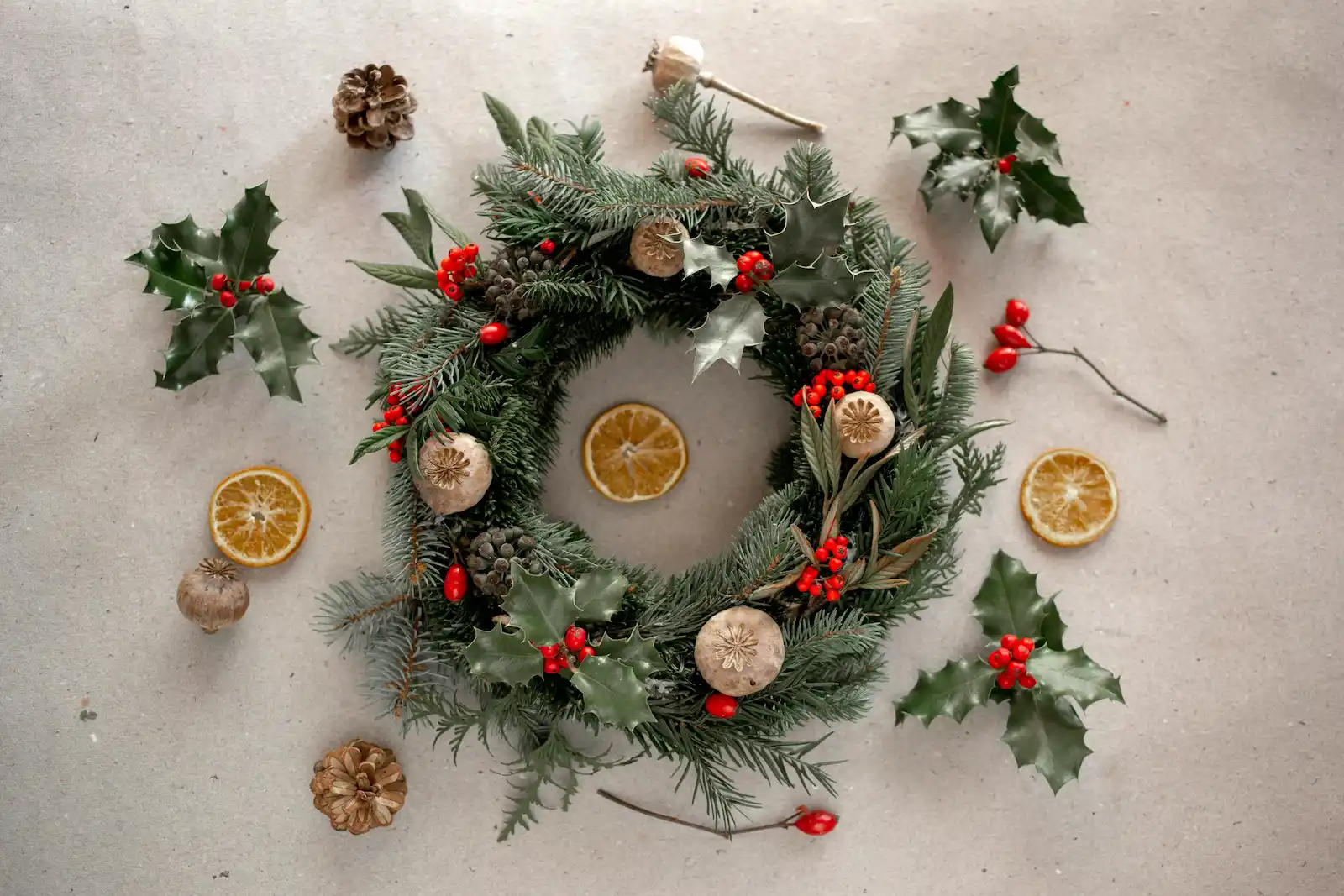 Holly wreath with dried fruits